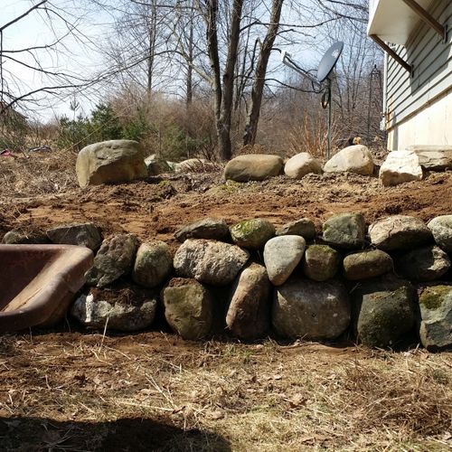 Moving rocks and fill dirt to add to your home lan