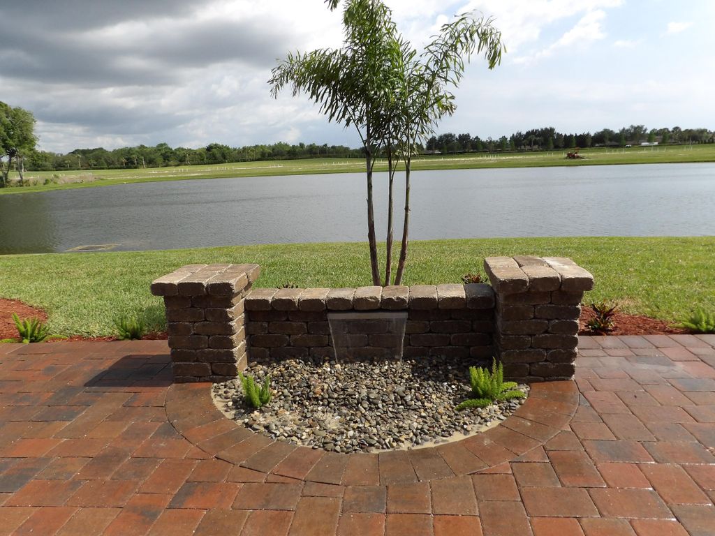 We installed a waterfall wall in this backyard.