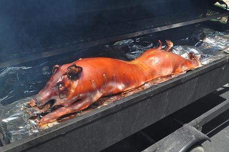 Pig roast cooked onsite. 