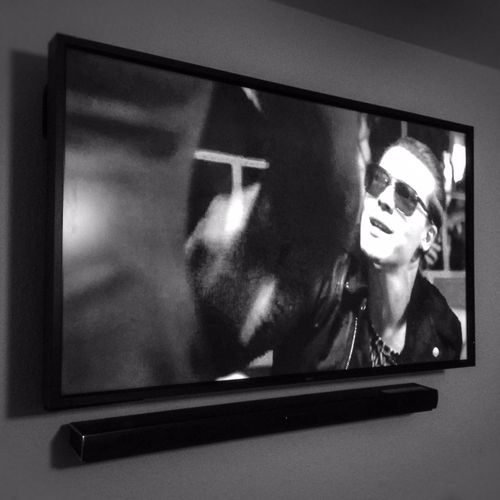 46" and sound bar mounted for a residential client