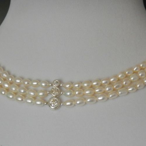 Diamond & White Topaz accented Pearl 3-strand Hand