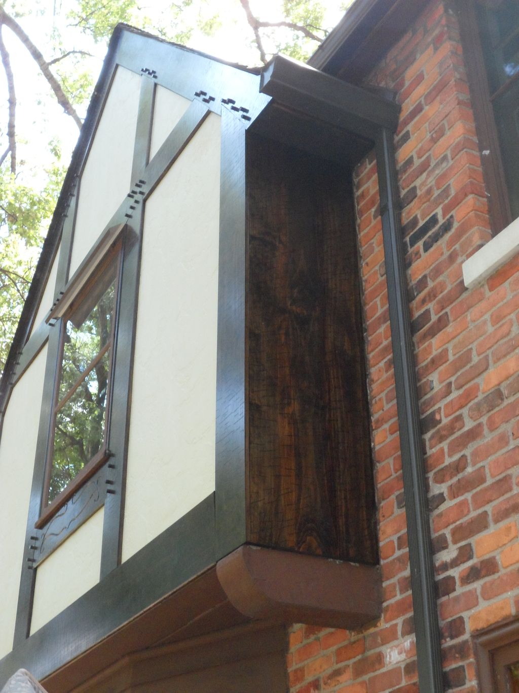 stucco panels with custom stained trim, used to be