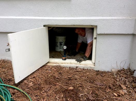 inspecting the crawlspace