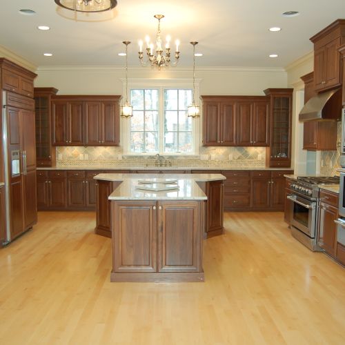Full custom kitchen with solid walnut cabinetry an