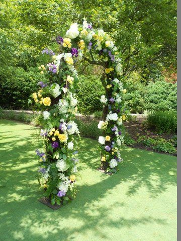 Rental Arch with a touch of greens and fresh flowe