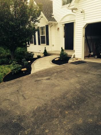 paver overlay on concrete pad and paver walkway wi