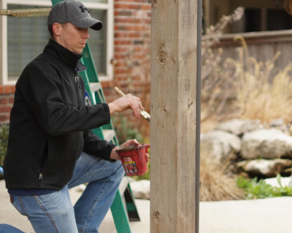 Staining exterior cedar support posts