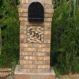 brick mailbox with custom tiled street number plat