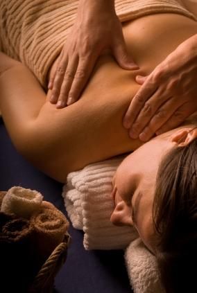Therapeutic massage to break down adhesions result