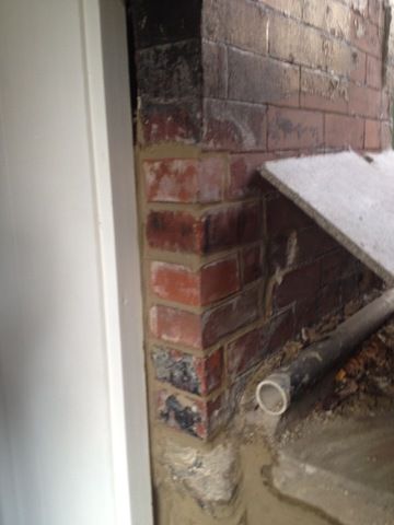 After repair of crumbling brick on doorframe