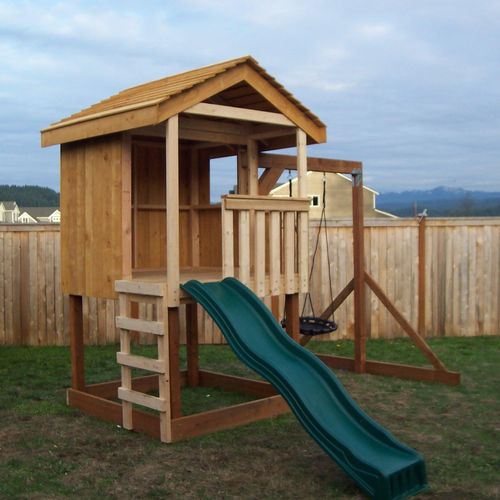 Playhouse, slide and swing set. 