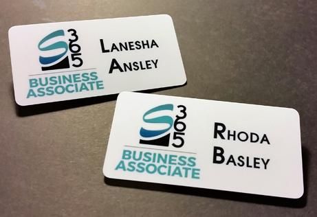 Full color magnetic name badges provide a level of