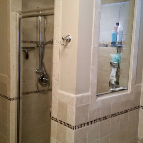 Custom shower stall with designer tile.