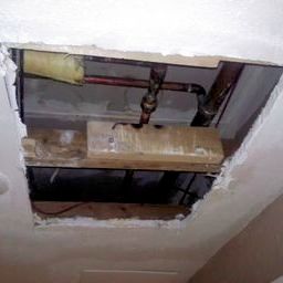 2nd angle- Plumbers replaced pipes, left a huge ho