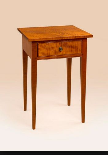 Sharker side table with veneer drawer front. All j