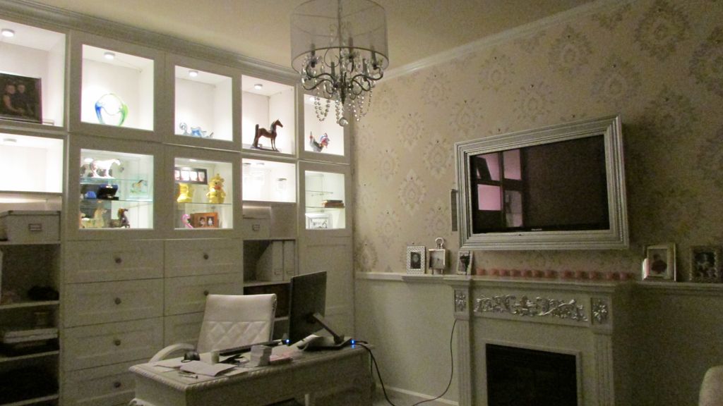 Custom office with built in cabinets.