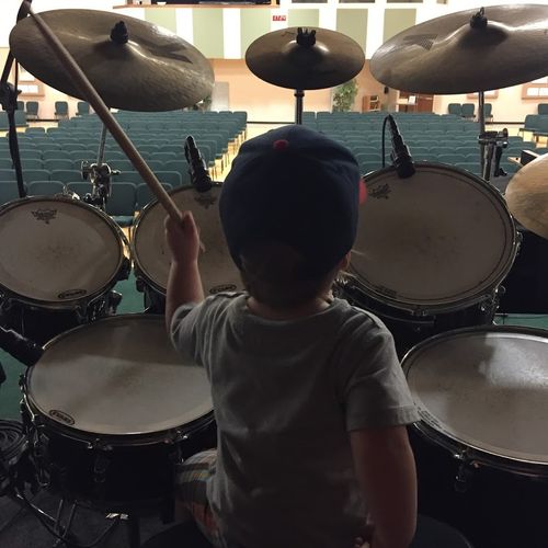 Teaching my son how to play drums