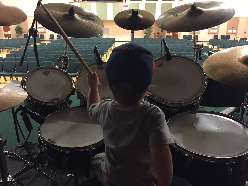 Teaching my son how to play drums