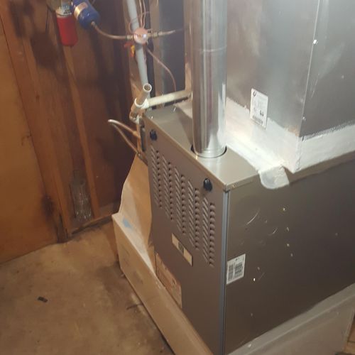 change out a service 20 year old furnace with bran