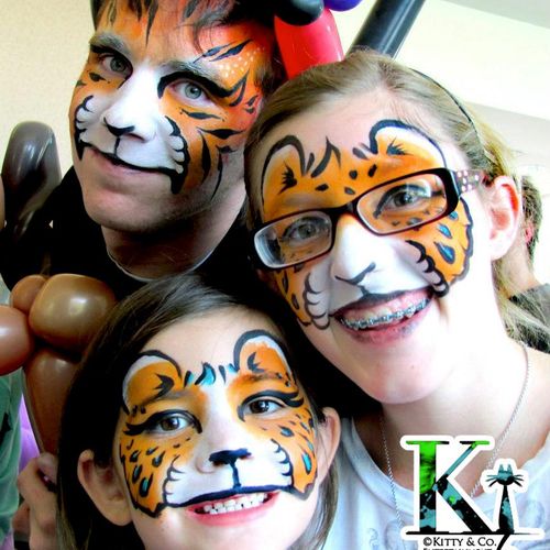 Face Painting - Three
Big Cats at a
Festival