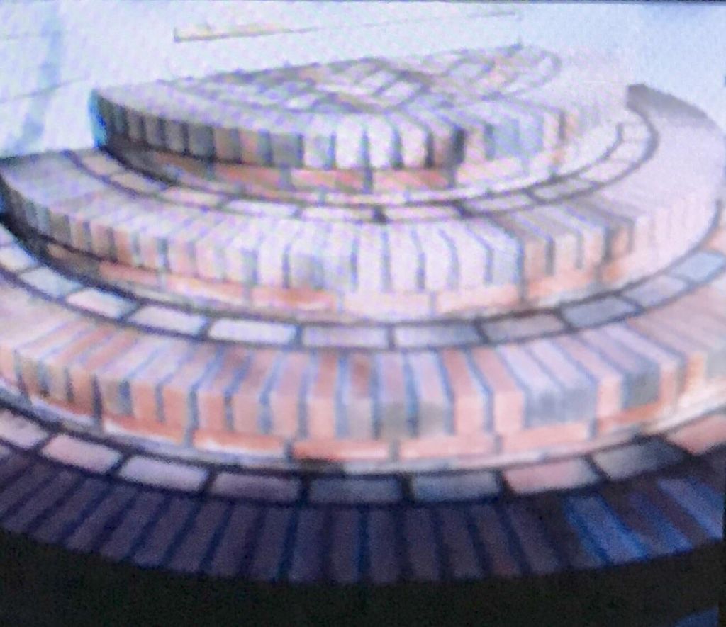 Brick half round with herringbone platform 