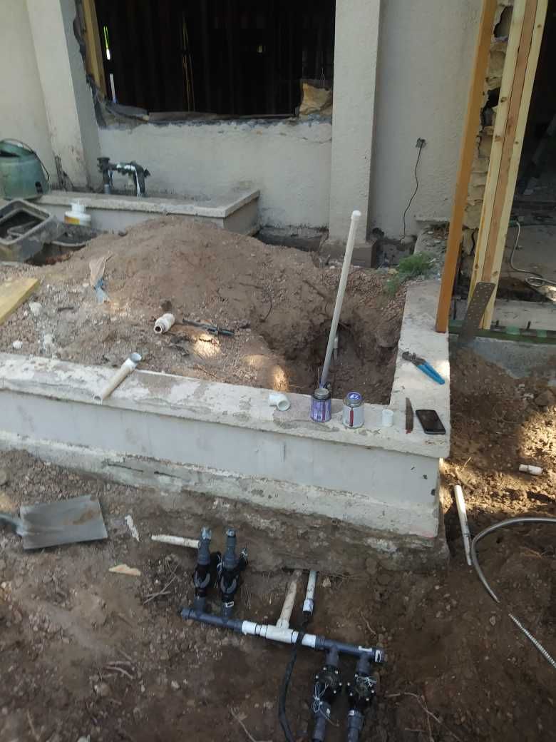 Running new PVC pipe on the mainline the contracto