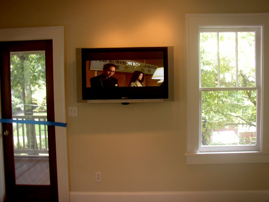 TV wall mount with equipment in diffrent room