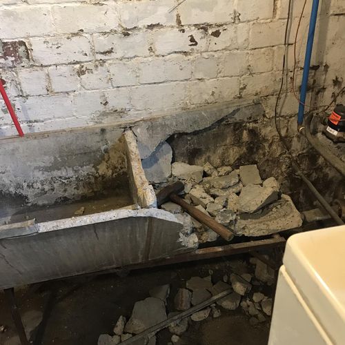 Replacing concrete utility tub