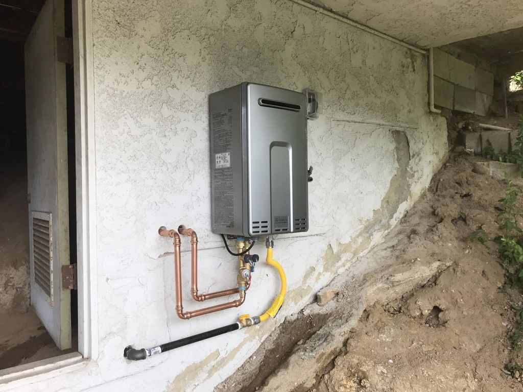 The new tankless waterheater is in and ready!