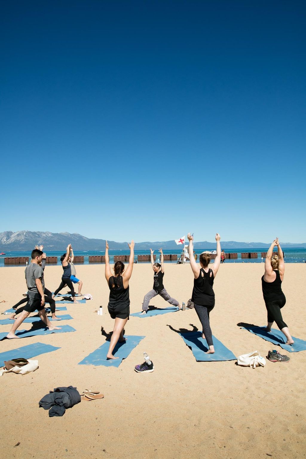 Private group yoga class on the beach.