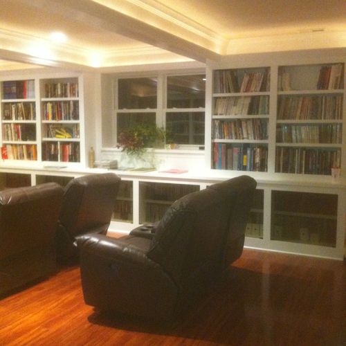 Built in bookcases with smoke glass doors @ bottom