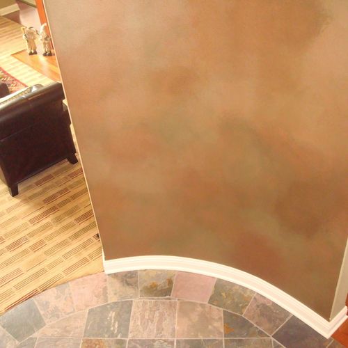Metallic, three color, color wash in front foyer.
