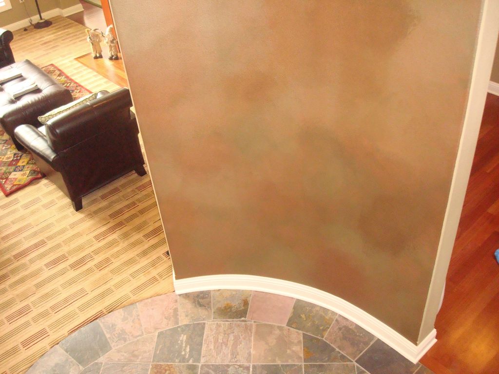 Metallic, three color, color wash in front foyer.