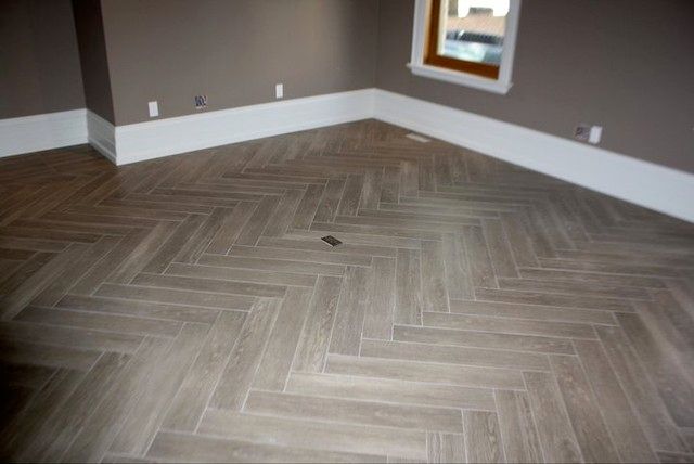 Ceramic tile floor in herringbone pattern

Wall & 