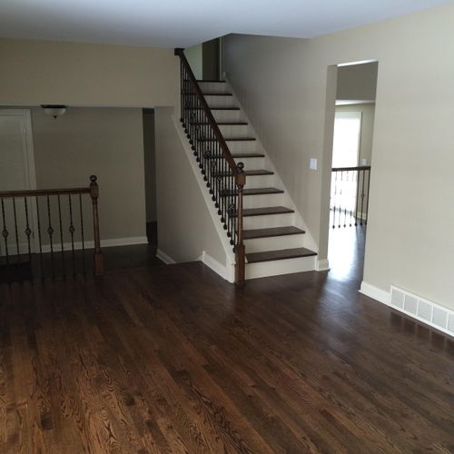 Installed brand new Harwood floors throughout the 