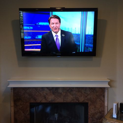 Over Fireplace TV Installation with concealed wire