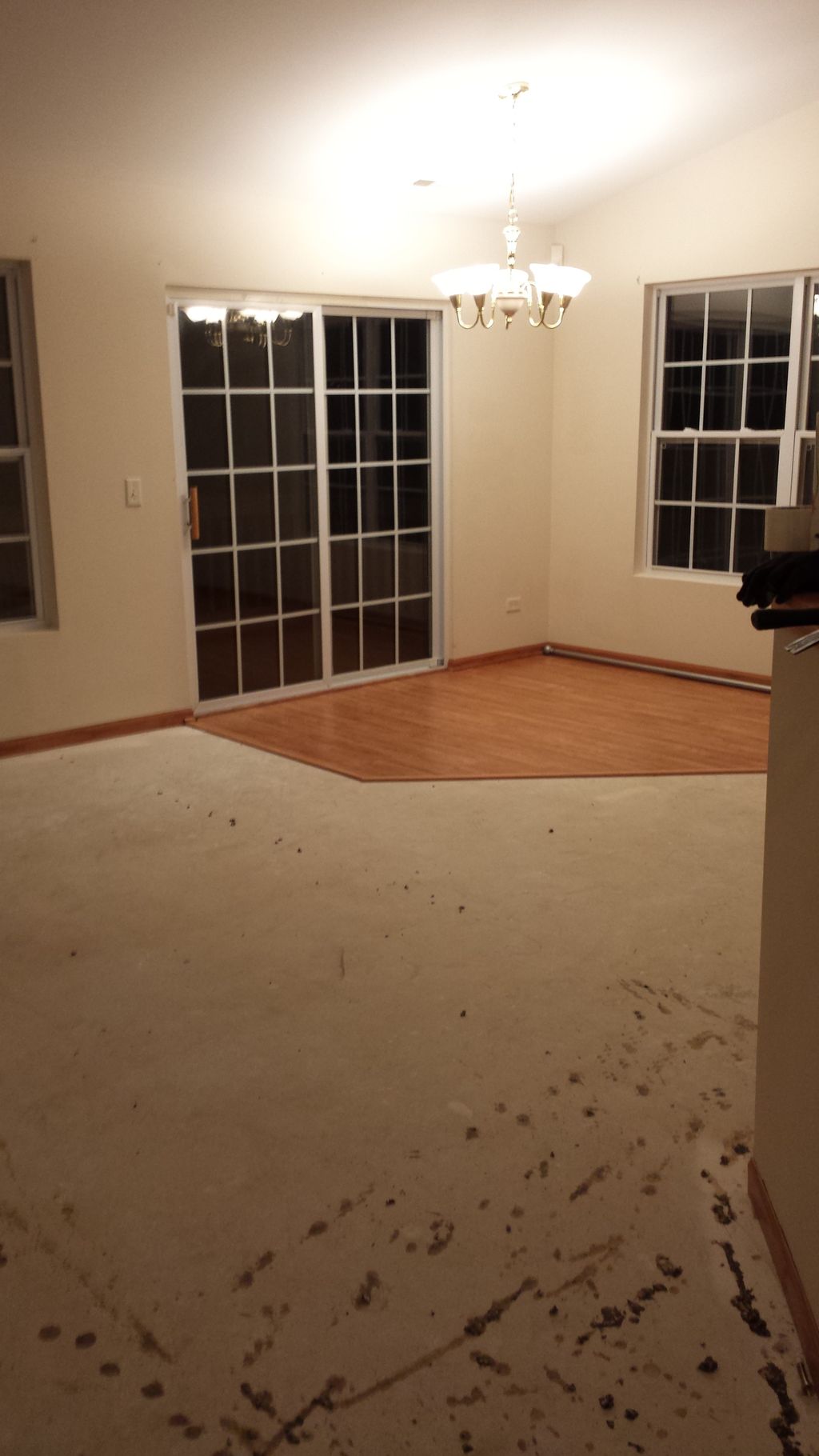 Living room after carpet removal and freshly paint