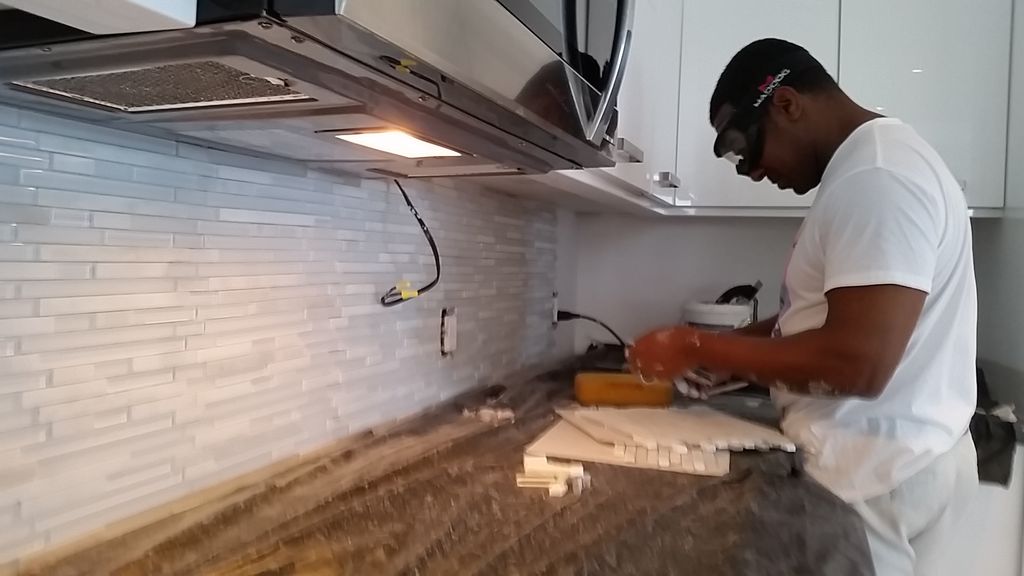 16' x 18" glass and ceramic backsplash cut to fit 