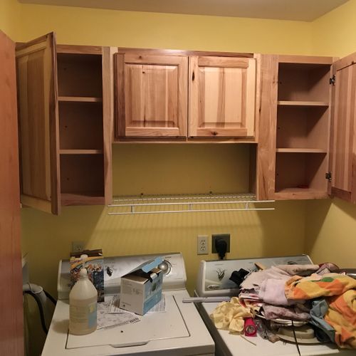A quick install of cabinets and shelving gave this