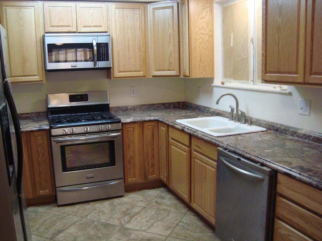 Kitchen remodel,installed cabinets,tile,added rece