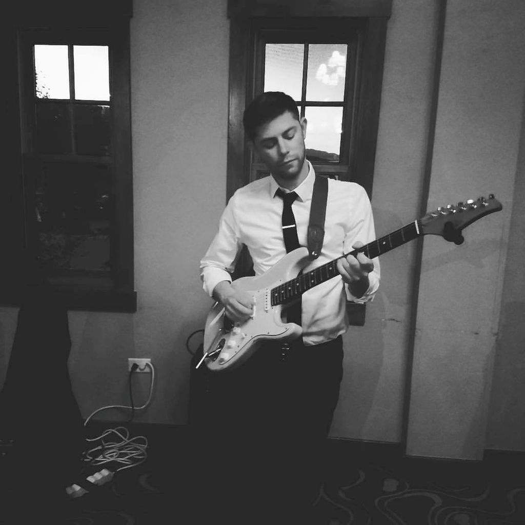 Playing guitar in Vail, CO