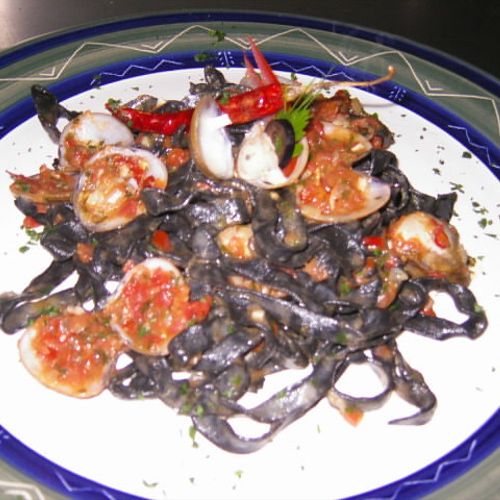 Black fresh pasta (made it calamari ink) with clai