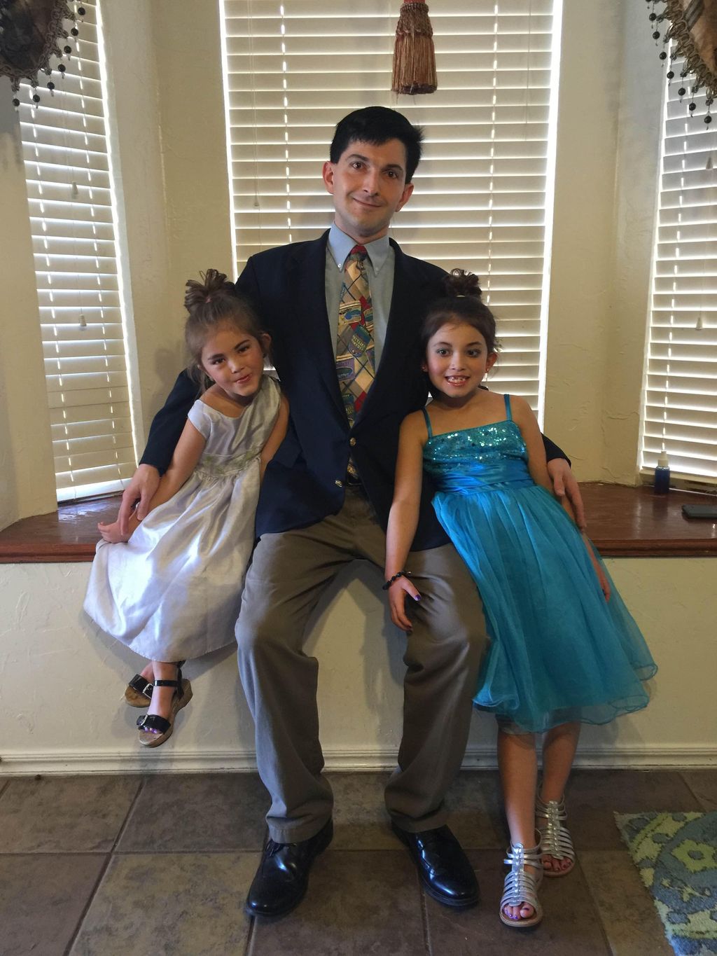 Dr. John Keefe II and two of his loving world's be