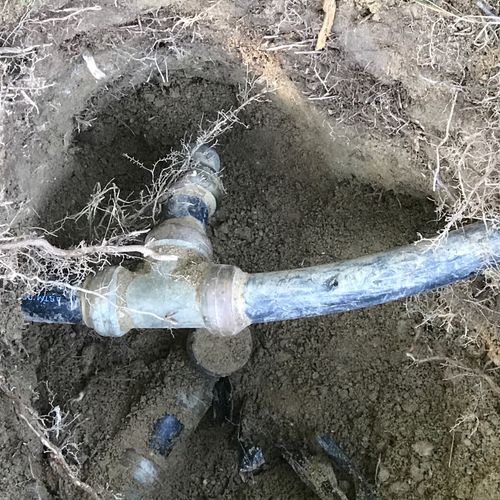 Repair sprinkler system connection to water line
