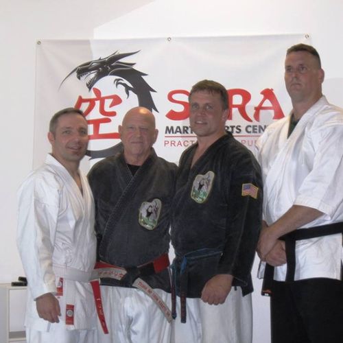Sensei Trimm with his Black Belts in New York. Joh