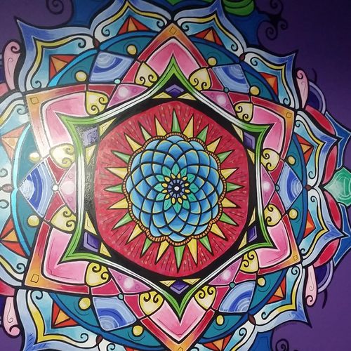 Mandala mural in bright bathroom