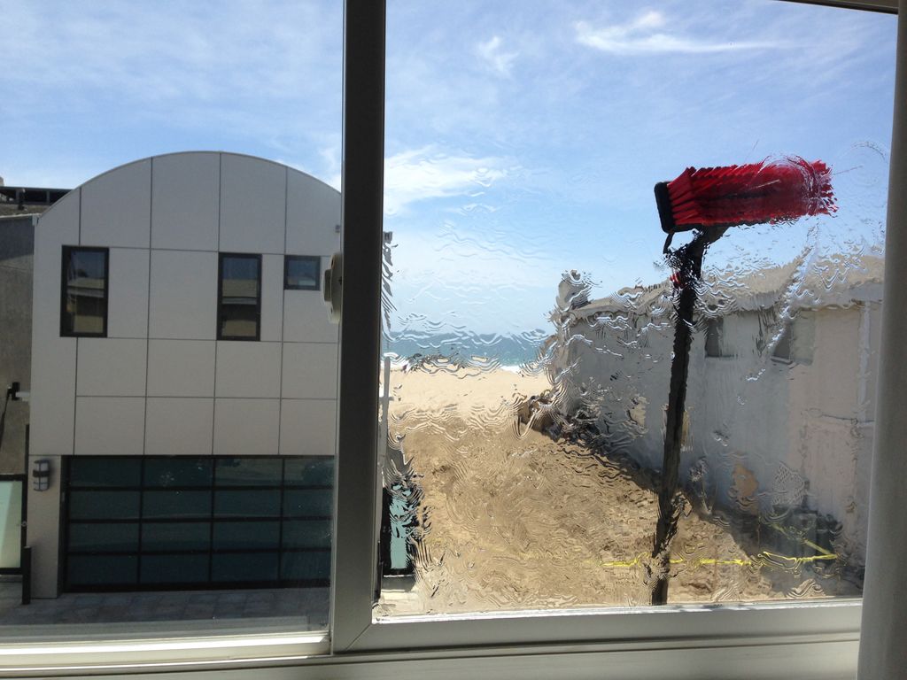 Water fed pole (tucker pole) method for cleaning h