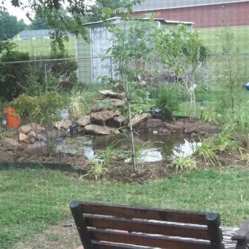 created a backyard pond, unfinished at the time.