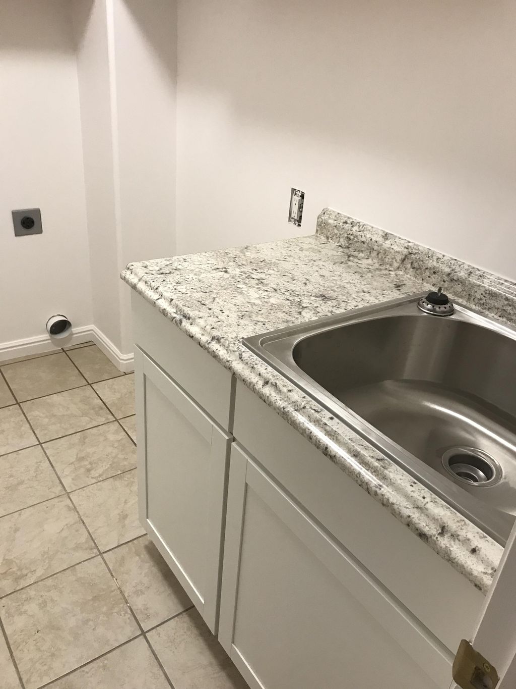 Install utility sink in laundry area