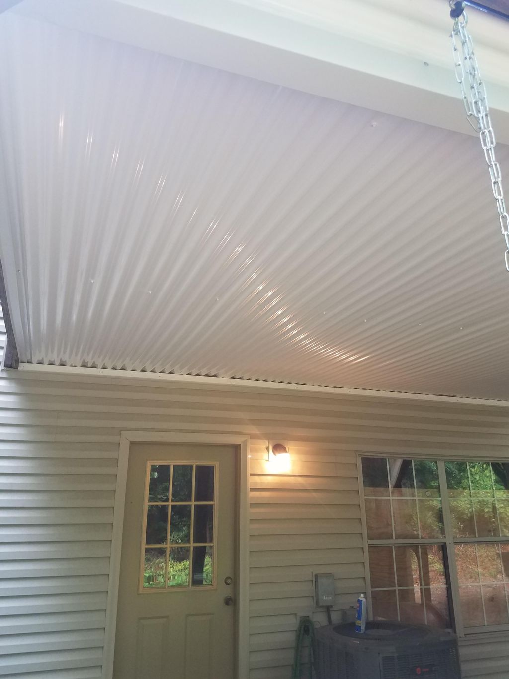 added paneling under and existing deck to allow fo